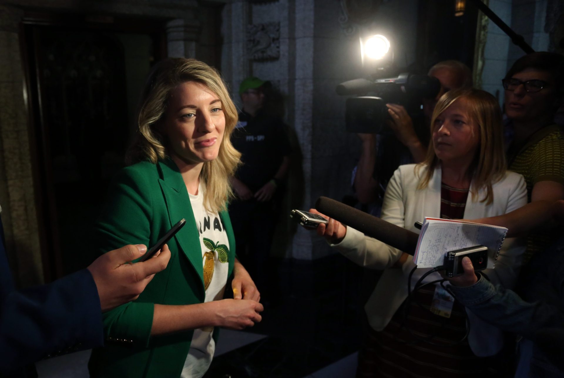 Minister of Canadian Heritage Melanie Joly scrums with reporters before Question Period on June 1, 2018.