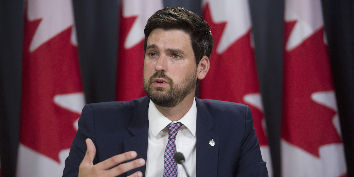 Sean Fraser, Parliamentary Secretary to the Minister of Environment and Climate Change,  and the Mona Fortier, MP Ottawa-Vanier, hold a media availability to speak about the Liberal government's fight against climate change and the challenges raised by Conservative politicians working against climate action at the National Press Theatre on July 9, 2019.