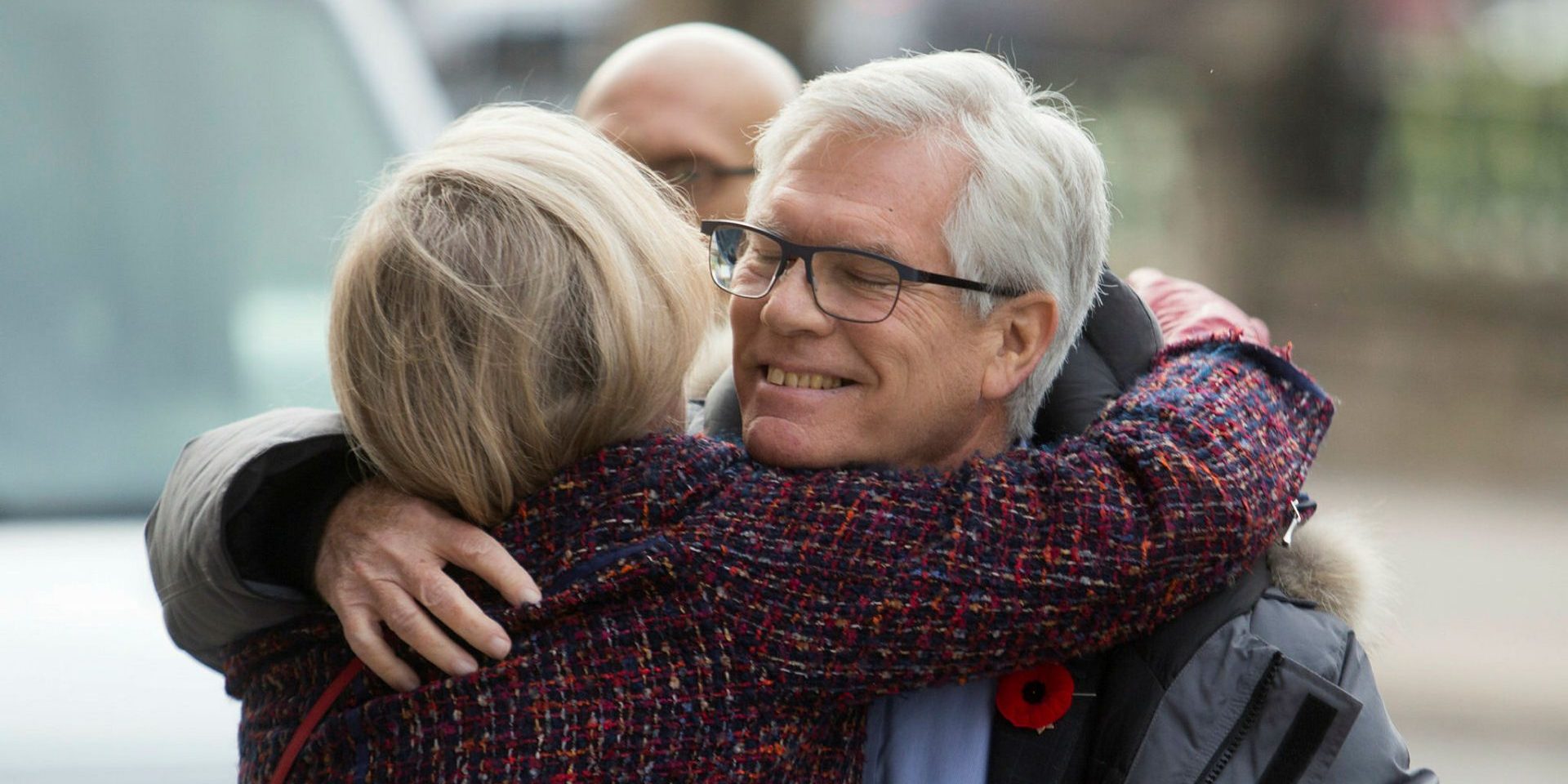 The late Jim Carr is greeted with a hug by his former cabinet colleague Carolyn Bennett in Nov. 2019.