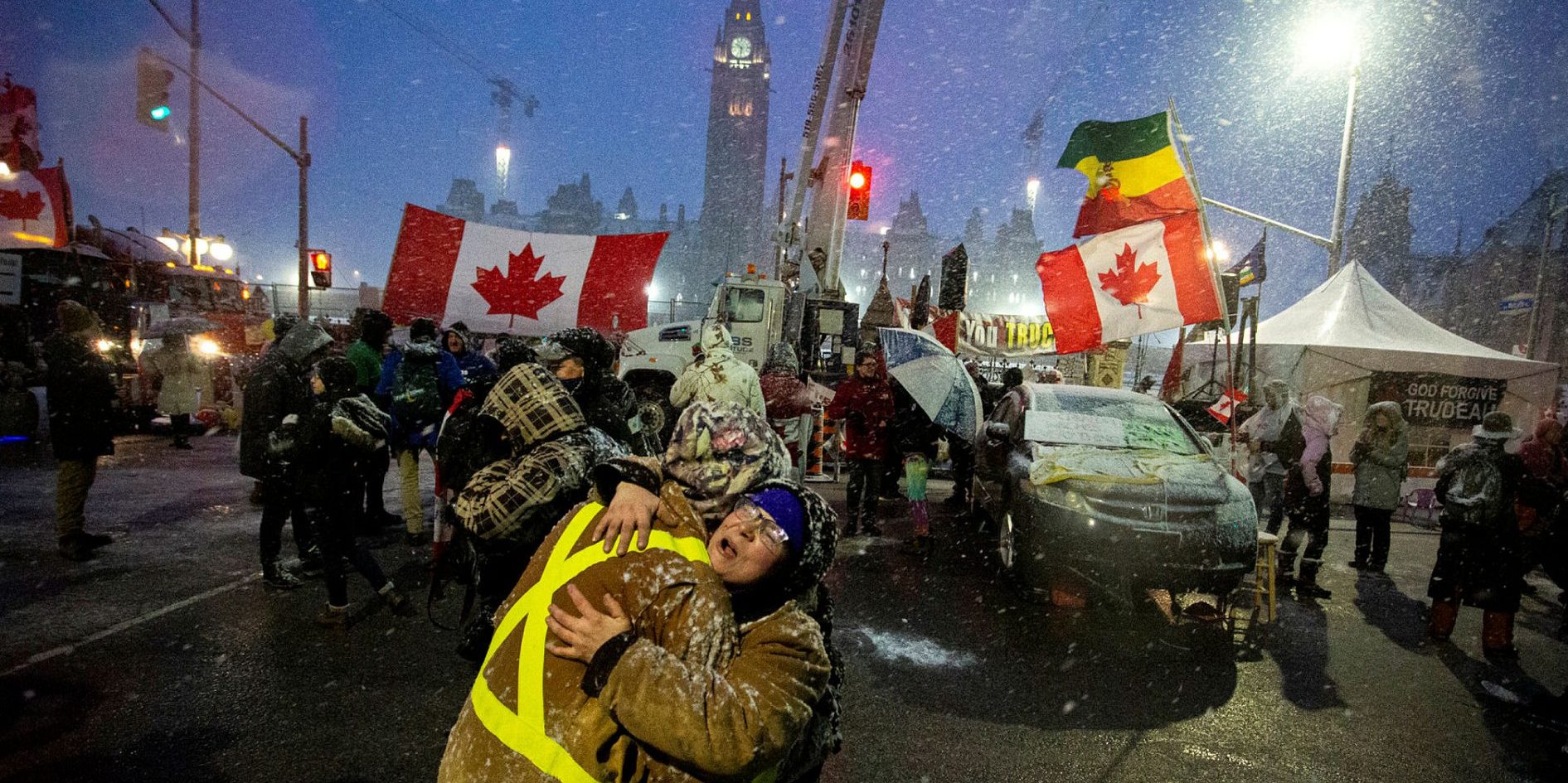 Freedom Convoy supporters embrace on Wellington Street on Feb. 17, 2022, as the convoy’s occupation of downtown Ottawa enters the third week.
Andrew Meade
