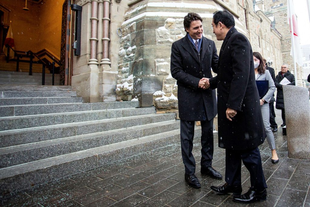 Prime Minister Justin Trudeau greets Japanese Prime Minister Fumio Kishida