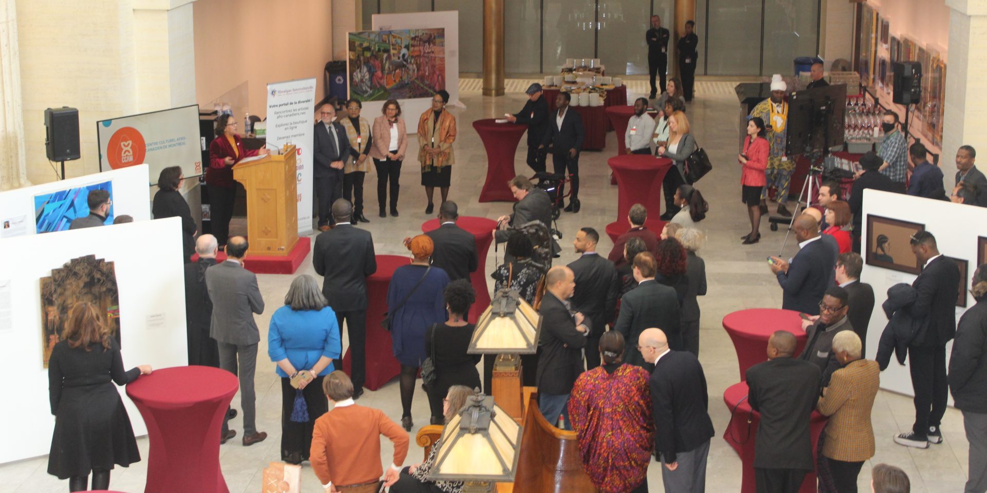 The crowd at the Senate African Canadian Caucus' vernissage for its Black History Month exhibit on Feb. 1, in the Senate Foyer. The exhibit will be on display the entire month of February.