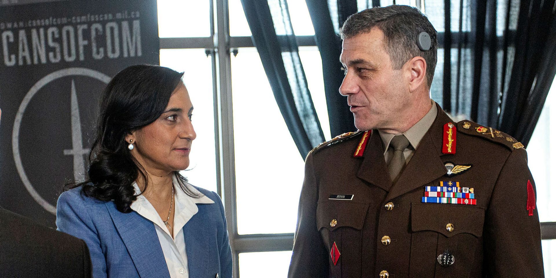 National Defence Minister Anita Anand, left, speaks with Maj.-Gen. Steve Boivin, commander of the Canadian Special Operations Command, after a press conference at National Defence headquarters in downtown Ottawa on March 21 to announce $1.4-billion in funding to revitalize the JTF-2 training site at Dwyer Hill. The Hill Times photograph by Andrew Meade