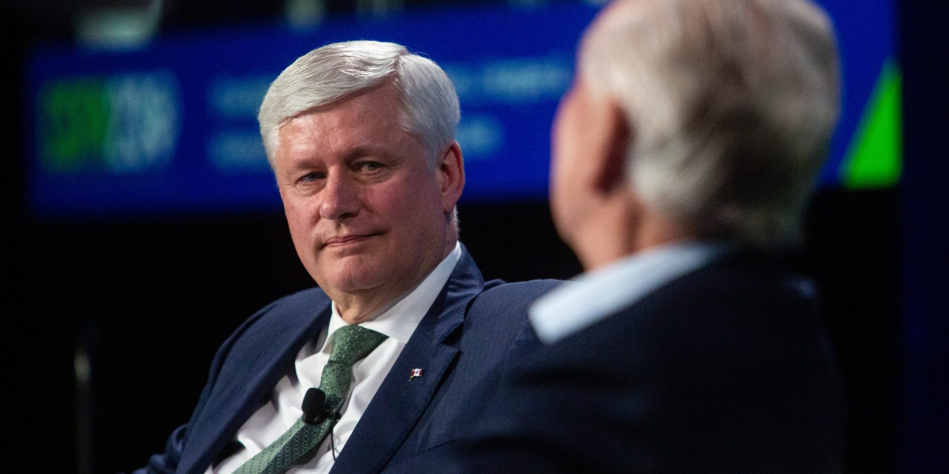 Former Prime Minister Steven Harper and former Reform Party leader Preston Manning have a fireside chat on the opening day of the Canada Strong and Free Networking conference in Ottawa on  March 22, 2023. The Hill Times photograph by Andrew Meade