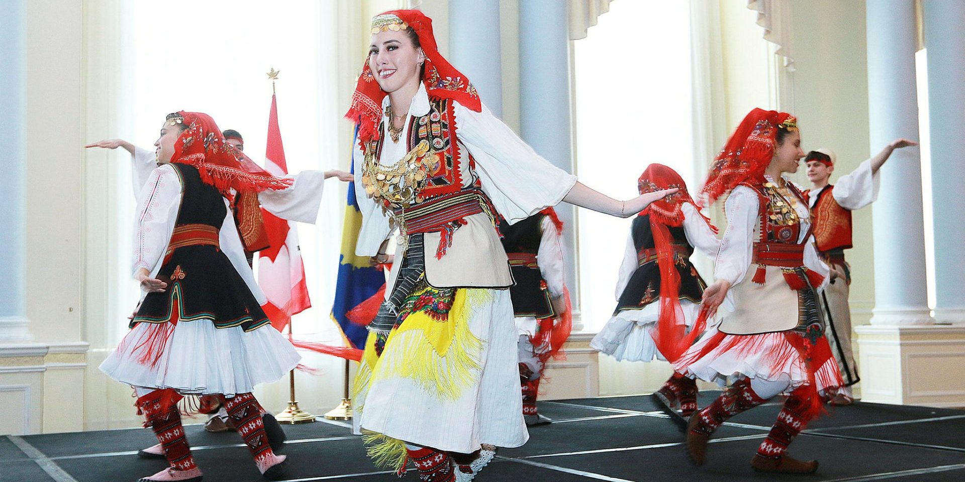 Traditional Albanian folk dance group Shqiponjat
e Vogla performs for guests.