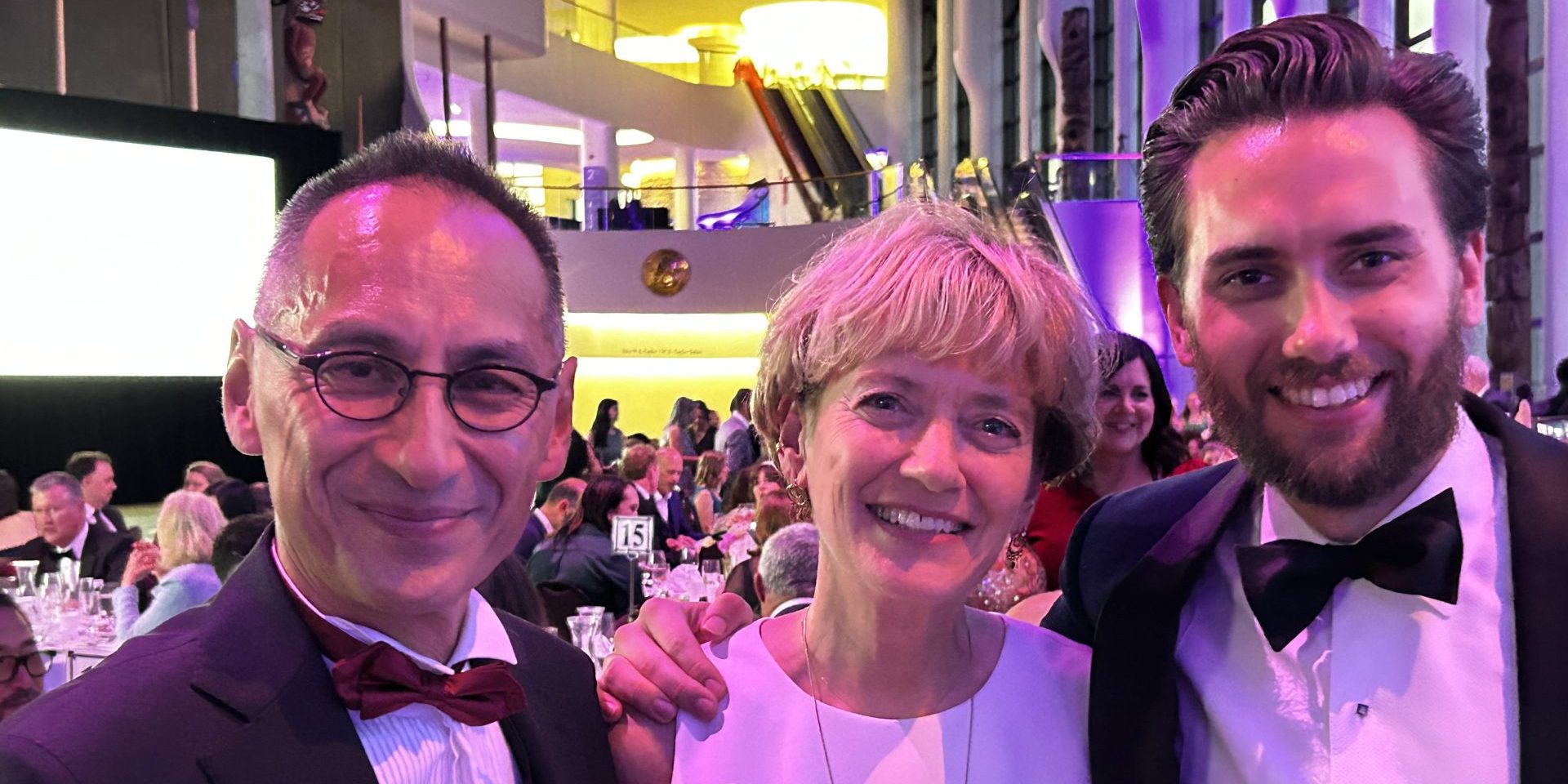 Howard Njoo, left, deputy chief public health officer at Public Health Agency of Canada; CTV's Joyce Napier, and Global News' Mackenzie Gray at the 2023 Parliamentary Press Gallery Dinner on June 10 at the Canadian Museum of History.