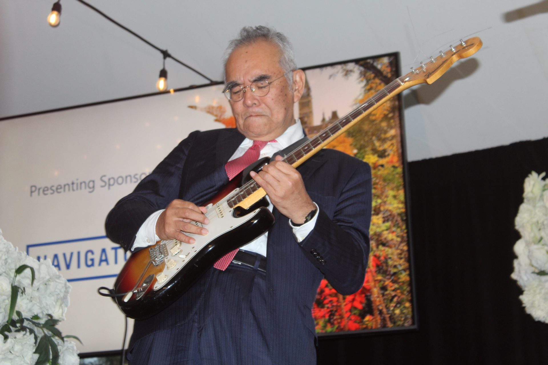 Japan's Ambassador to Canada Kanji Yamanouchi shreds out a rendition of 'O Canada' to kick off the second annual Do It For Democracy reception hosted by the Parliamentary Centre and the British High Commissioner at Earnscliffe on Sept. 26.