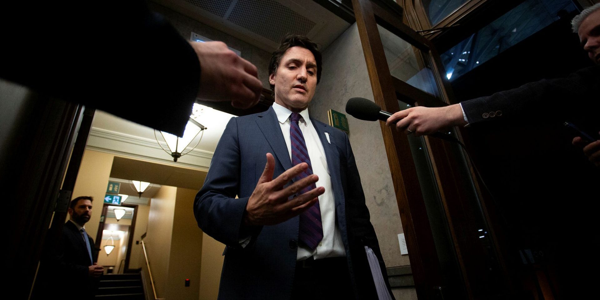 Prime Minister Justin Trudeau speaks with reporters in the House of Commons foyer before Question Period on  Dec. 6, 2023.