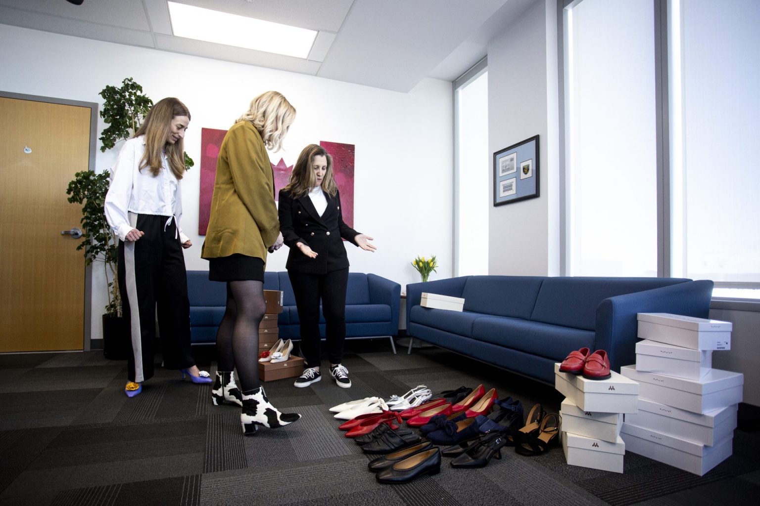 Finance Minister Chrystia Freeland tries on new shoes in preparation