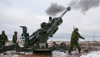 Members of the Canadian Armed Forces deployed to the enhanced Forward Presence Battle Group practice their skills with the M777 howitzer as part of Operation REASSURANCE at Camp Adazi, Latvia, January 5, 2023.

 

Photo: Corporal Darren McDonald