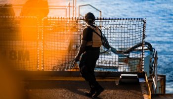 Royal Canadian Navy sailor aboard HMCS Harry DeWolf conducts force protection while departing from a Port Visit in Ocho Rios, Jamaica in order to continue, sailing on Operation CARIBBE, Caribbean Sea, February 25 2025.

 

Photo by: Canadian Armed Forces