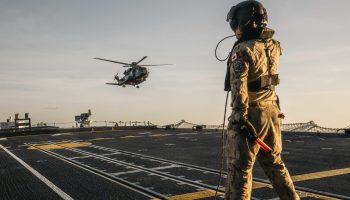 Corporal Andrew Brandt signals to CH-148 Cyclone helicopter, Avalanche, to return to the flight deck in order to perform deck evolutions, onboard HMCS Ville de Québec, while sailing as part of the UK-led Carrier Strike Group, during Op HORIZON, in the North Atlantic Ocean, on 26 April 2025

 

Photo by: Corporal Brendan Gamache, Formation Imaging Services