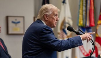 U.S. President Donald Trump signs the VA Home Loan Program Reform Act, Wednesday, July 30, 2025, in the Roosevelt Room. White House photograph by Molly Riley
