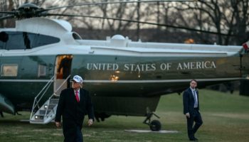President Donald Trump disembarks Marine One on the South Lawn of the White House on Tuesday, January 13, 2026, after a trip to Detroit, Michigan. Official White House photograph by Joyce N. Boghosian