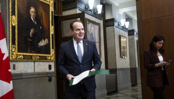 Government House Leader Steven MacKinnon speaks with reporters in the House of Commons foyer on Jan. 26. The Hill Times photograph by Andrew Meade