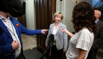 Liberal MP Judy Sgro arrives for the Liberal party caucus meeting from West Block  on Oct. 26, 2022.