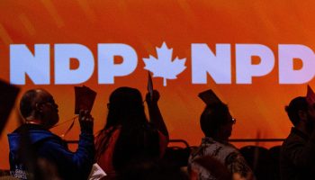 `Delegates vote on a resolution at the New Democratic Party convention in Hamilton on Oct. 14, 2023. Andrew Meade