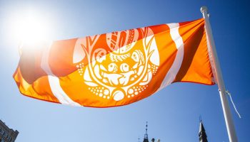The Surviors Flag flies at the National Day of Truth and Reconciliation event in Ottawa on  Sept. 30, 2025. The Hill Times photograph by Andrew Meade