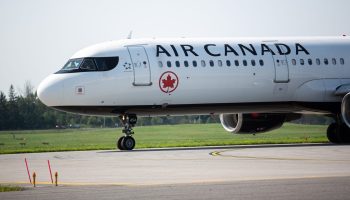 An Air Canada airplane takes off from the Macdonald Cartier Airport in Ottawa on Aug. 9, 2023.