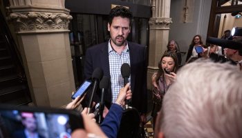 Minister of Justice and Attorney General of Canada and Minister responsible for the Atlantic Canada Opportunities Agency Sean Fraser speaks with reporters outside the Liberal party caucus meeting from West Block  on June 4, 2025. The Hill Times photograph by Andrew Meade