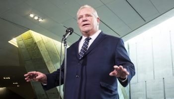 Premier of Ontario Doug Ford arrives for the First Ministers meeting at the Canadian War Museum in Ottawa on March 21, 2025. The Hill Times photograph by Andrew Meade