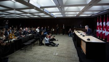 Prime Minister Mark Carney holds his first press conference after the 45th general election in the National Press Conference in Ottawa, Onr. on May 2, 2025. The Hill Times photograph by Andrew Meade