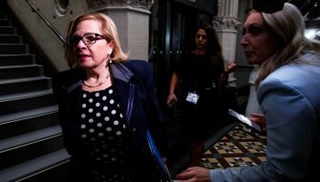 Minister of Immigration Refugees and Citizenship Lena Diab walks past reporters before the Liberal cabinet meeting in West Block on  Sept. 16, 2025. Hill Times photograph by Andrew Meade