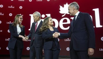 Leadership hopefuls Karina Gould, Frank Bayliss, Chrystia Freeland and Mark Carney pose for a family photo before the Liberal Party leadership debate in Montreal, Que. on Feb. 25. The Hill Times photograph by Andrew Meade