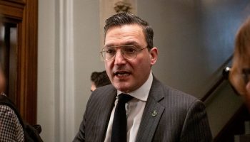 Minister of Artificial Intelligence and Digital Innovation and Minister responsible for the Federal Economic Development Agency for Southern Ontario Evan Solomon speaks with reporters before the Liberal party caucus meeting in West Block  on Oct. 29, 2025. The Hill Times photograph by Andrew Meade