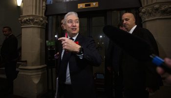 Minister of Finance and National Revenue François-Philippe Champagne speaks with reporters before the Liberal cabinet meeting in West Block on  Nov. 4, 2025. The Hill Times photograph by Andrew Meade