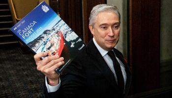 Minister of Finance and National Revenue François-Philippe Champagne takes the 2025 budget into the House of Commons to table iton  Nov. 4, 2025. The Hill Times photograph by Andrew Meade