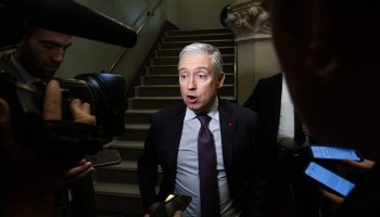 Minister of Finance and National Revenue François-Philippe Champagne speaks with reporters before the Liberal cabinet meeting in West Block on  Oct. 21, 2025. The Hill Times photograph by Andrew Meade