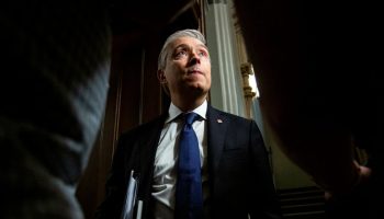 Minister of Finance and National Revenue François-Philippe Champagne speaks with reporters before the Liberal party caucus meeting in West Block  on June 11, 2025. Hill Times photograph by Andrew Meade