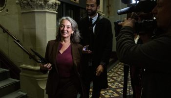 Minister of Environment and Climate Change Julie Dabrusin arrives for the Liberal cabinet meeting in West Block on  Oct. 21, 2025. The Hill Times photograph by Andrew Meade