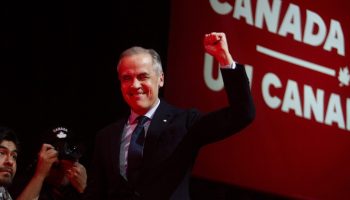 Prime Minister Mark Carney takes the stage at a election night event in Ottawa, Ont. on April 2025, after securing a Liberal government. The Hill Times photograph by Andrew Meade