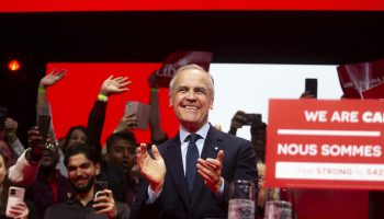 Prime Minister Mark Carney takes the stage at a election night event in Ottawa, Ont. on April 2025, after securing a Liberal government. The Hill Times photograph by Andrew Meade