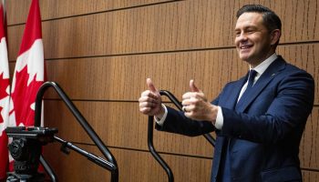 568A0124_36 Conservative Party Leader Pierre Poilievre gives a thumbs up after addressing his caucus before their meeting in West Block on Sept. 14,  2025. The Hill Times photograph by Andrew Meade