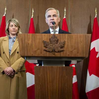 Prime Minister Mark Carney holds a press conference in West Block on  June 19, 2025. Left to right: Minister responsible for Canada-U.S. Trade Dominic LeBlanc, Industry Minister Mélanie Joly, Prime Minister Mark Carney and Finance Minister François-Philippe Champagne.  The Hill Times photograph by Andrew Meade.