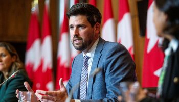 Minister of Housing, Infrastructure and Communities Sean Fraser speaks at a press conference in Ottawa on Sept. 26, 2023, to announce that the annual limit for Canada Mortgage Bonds is being increased from $40 billion to up to $60 billion.