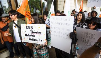 A group of First Nations youth gather outside the Prime Minister’s First Nations summit on Bill C-5 in Gatineau, Que. on July 17, 2025, calling on the government to respect treaty rights and oppose Bill C-5. The Hill Times photograph by Andrew Meade