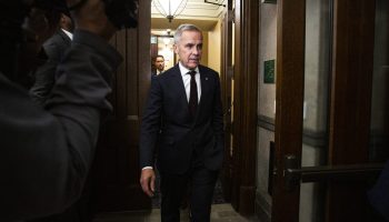 Prime Minister Mark Carney arrives at the House of Commons for Question Period on  Oct. 1, 2025. The Hill Times photograph by Andrew Meade