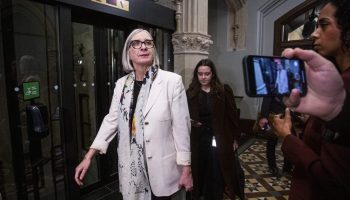Minister of Jobs and Families and Minister responsible for the Federal Economic Development Agency for Northern Ontario Patty Hajdu speaks with reporters before the Liberal cabinet meeting in West Block on  Nov. 25, 2025. The Hill Times photograph by Andrew Meade