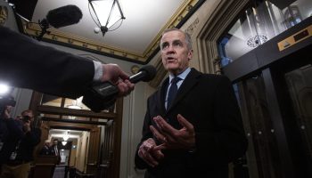 Prime Minister Mark Carney speaks with reporters before the Liberal cabinet meeting in West Block on  Dec. 2, 2025. The Hill Times photograph by Andrew Meade