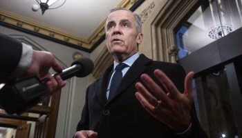 Prime Minister Mark Carney speaks with reporters before the Liberal cabinet meeting in West Block on  Dec. 2, 2025. The Hill Times photograph by Andrew Meade