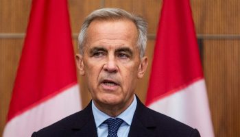 Prime Minister Mark Carney holds a press conference in the National Press Theatre on July 30, 2025. The Hill Times photograph by Andrew Meade