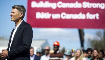 Minister of Housing and Infrastructure and Minister responsible for Pacific Economic Development Canada Gregor Robertson attends an announcement at a modular home construction site in Napean, Ont. on Sept. 14,  2025, about Build Canada Homes and the government plans to expand and innovate home building. The Hill Times photograph by Andrew Meade