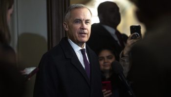 Prime Minister Mark Carney speaks with reporters before the Liberal cabinet meeting in West Block on  Feb. 10, 2026. Hill Times photograph by Andrew Meade