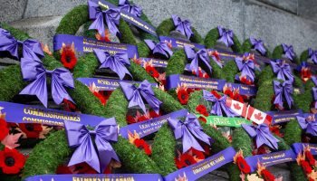 Wreaths lay at the base of  the National War Memorial in Ottawa on  Nov. 11, 2024, after the National Remembrance Day ceremony. The Hill Times photograph by Andrew Meade