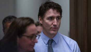 Prime Minister Justin Trudeau leaves the Liberal party caucus meeting in West Block  on Nov. 20, 2024. The Hill Times photograph by Andrew Meade