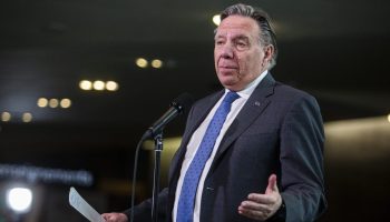 Premier of Quebec Francois Legault speaks with reporters after arriving at the First Ministers meeting at the Canadian War Museum in Ottawa on March 21, 2025. The Hill Times photograph by Andrew Meade